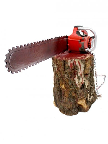 Bloodied Chainsaw with Block of Wood