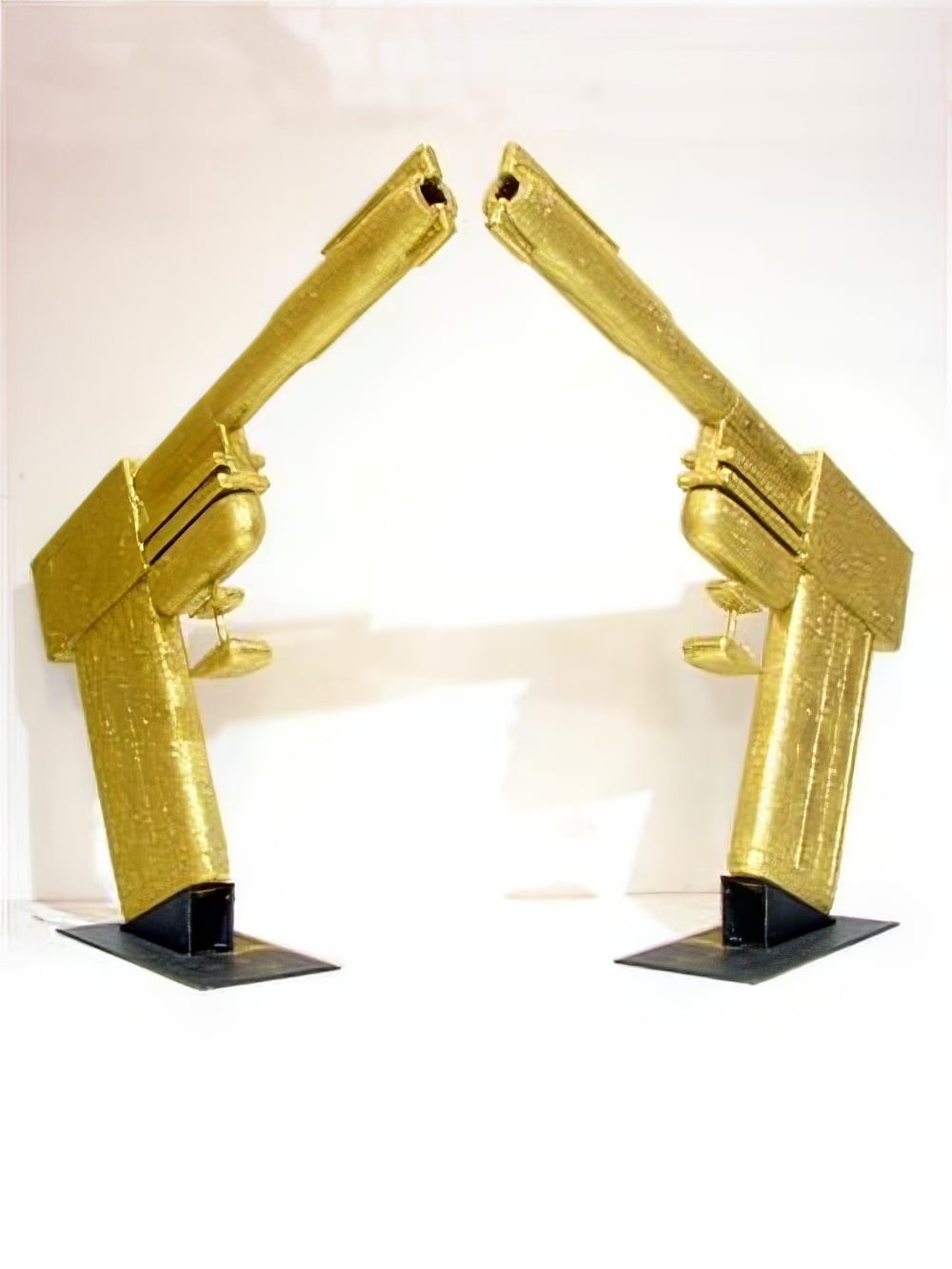 giant_golden_gun_pair_prop_01.jpg